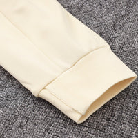PSG Premium Trainingsanzug Beige und Schwarz